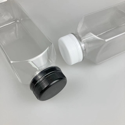 뚜?? 과 손잡이 에 나사 를 달고 있는 고립 된 플라스틱 우유 차 병